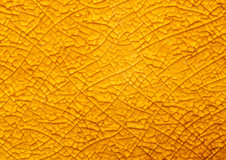 Detail of a golden crackled surface
